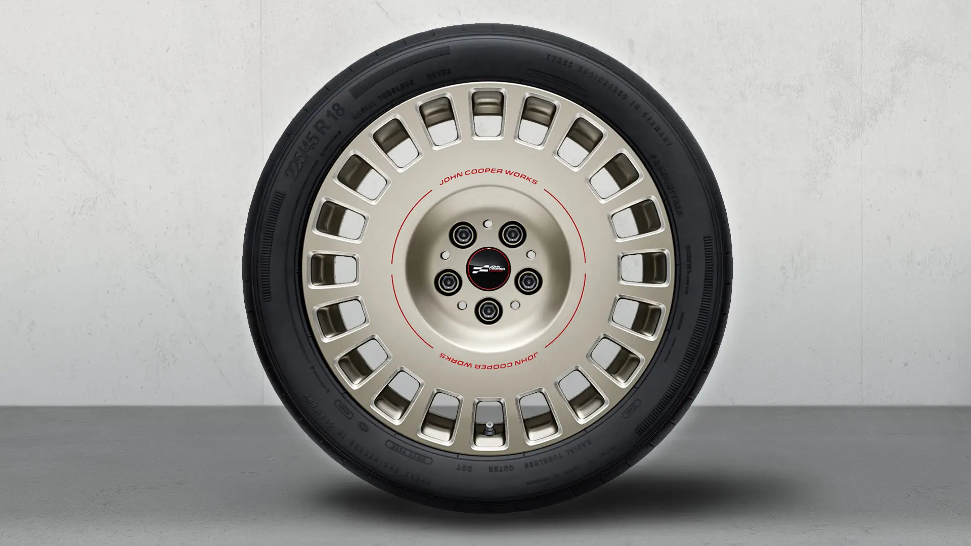 18" John Cooper Works alloy summer wheel, Rallye Spoke style 992 in Vibrant Silver, gloss-milled.